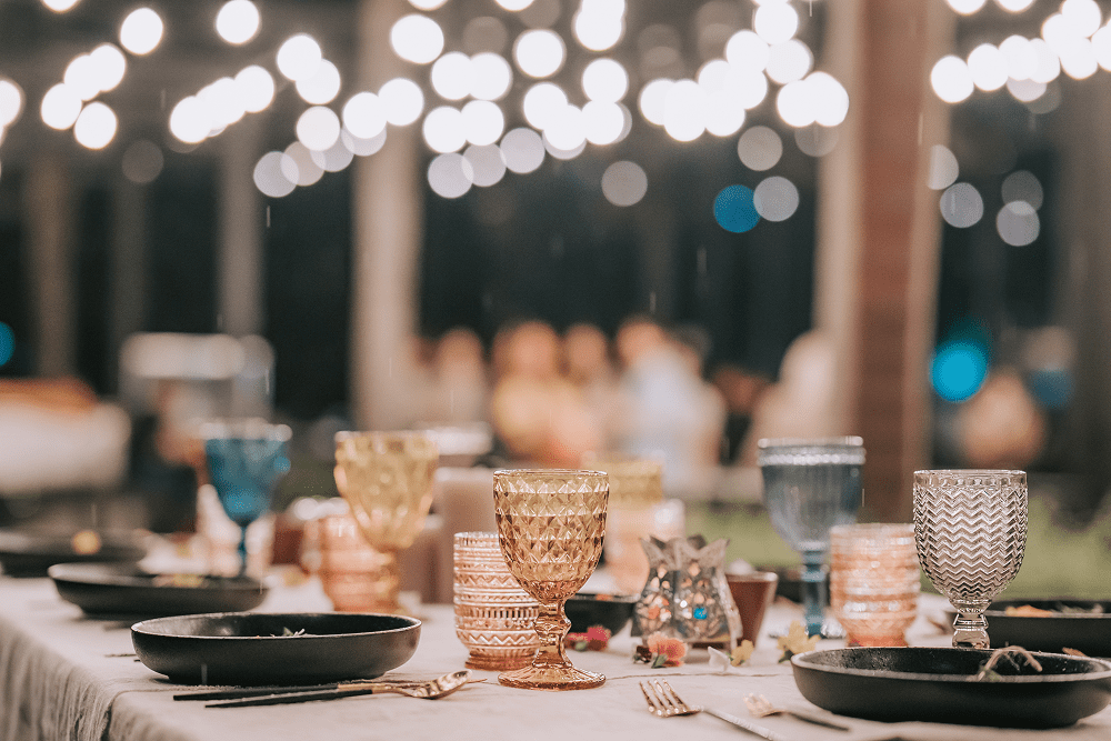 Elegant outdoor dinner setting with lights